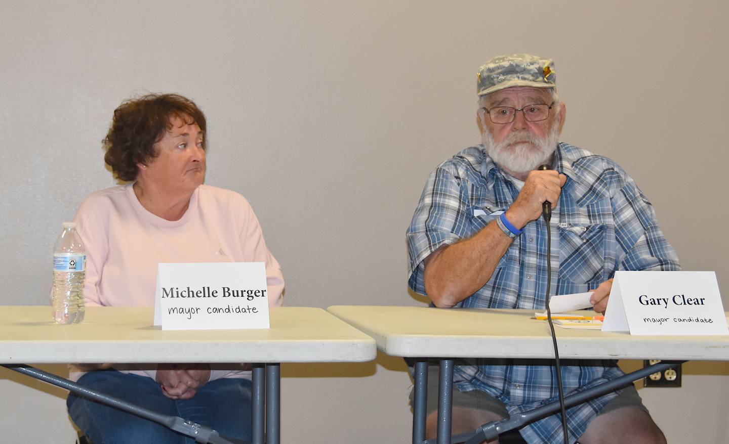 Candidates for the Afton mayoral race, incumbent Michelle Burger and Gary Clear, during the Afton candidate forum.