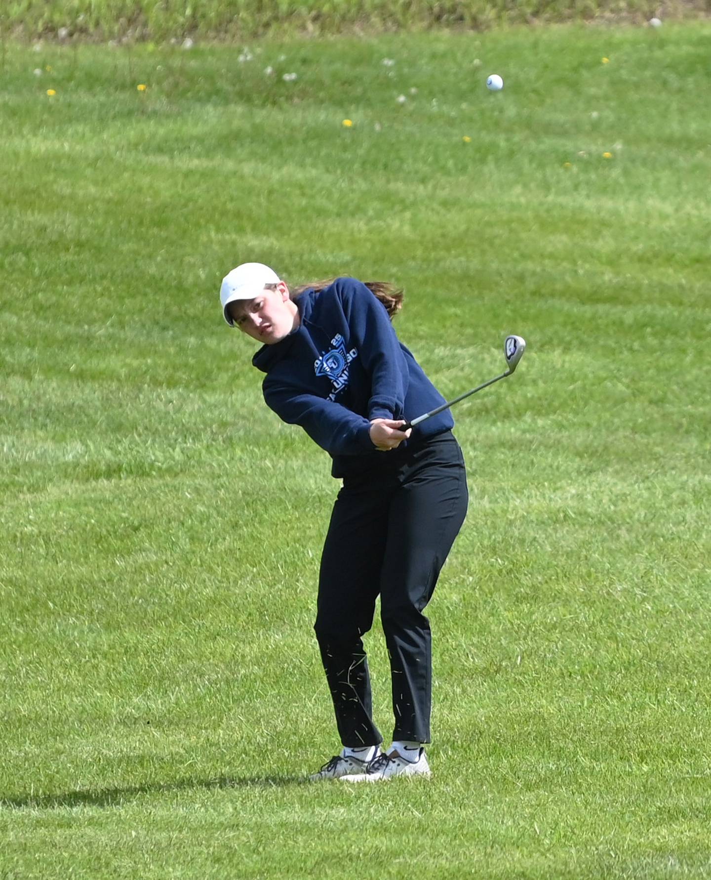 East Union's Gwen Nixon takes an approach shot on hole 9.