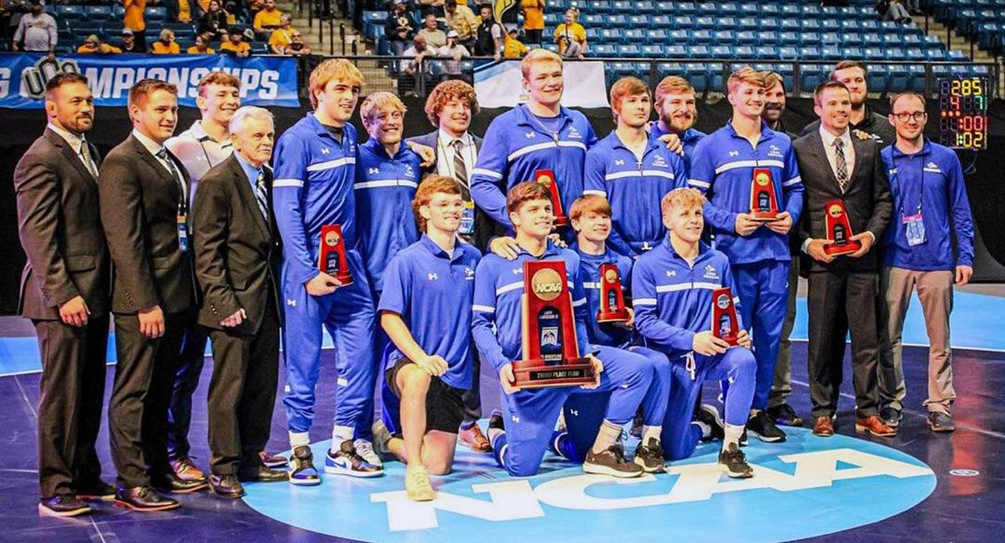 The University of Nebraska-Kearney wrestling team earned the third-place team trophy with 77.5 points at the NCAA Division II tournament. The team includes 197-pound fourth-place finisher Jackson Kinsella of Creston (first wrestler on left in back row) and 285-pound third-place finisher Crew Howard of Clarinda (center of back row).