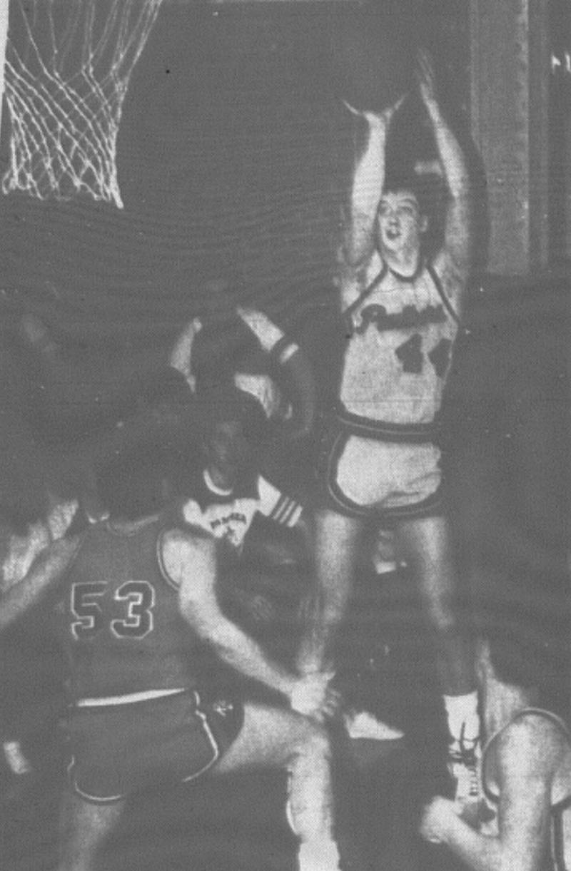This jump shot by Creston’s Matt Somers (44) fellt through the hoop to start a Panther comeback in the first quarter against Red Oak here Friday after the Tigers had taken an early 11-6 lead. Somers went on to score 14 points and grab six rebounds.