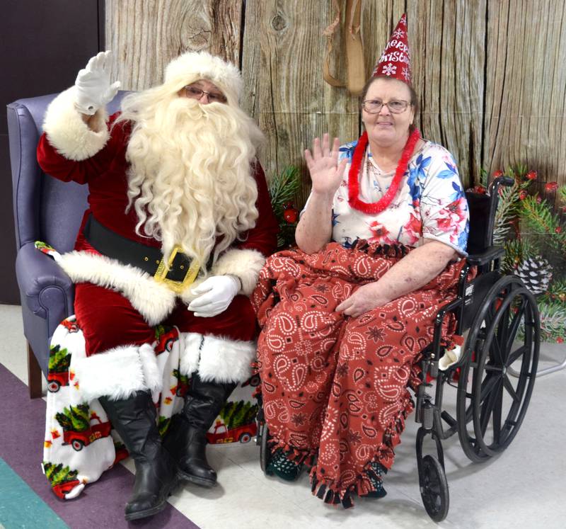 Santa Claus took time off during his busy season to meet with residents at Creston Speciality Care on Wednesday, Dec. 23.