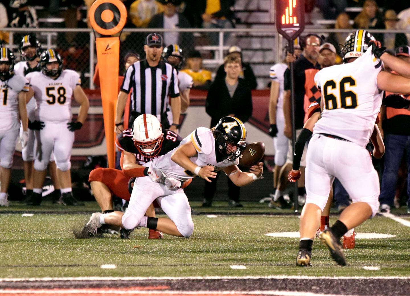 Creston senior Lucas Travis stops the runner at the line of scrimmage. Once again, Travis led the defense with 10.5 total tackles.