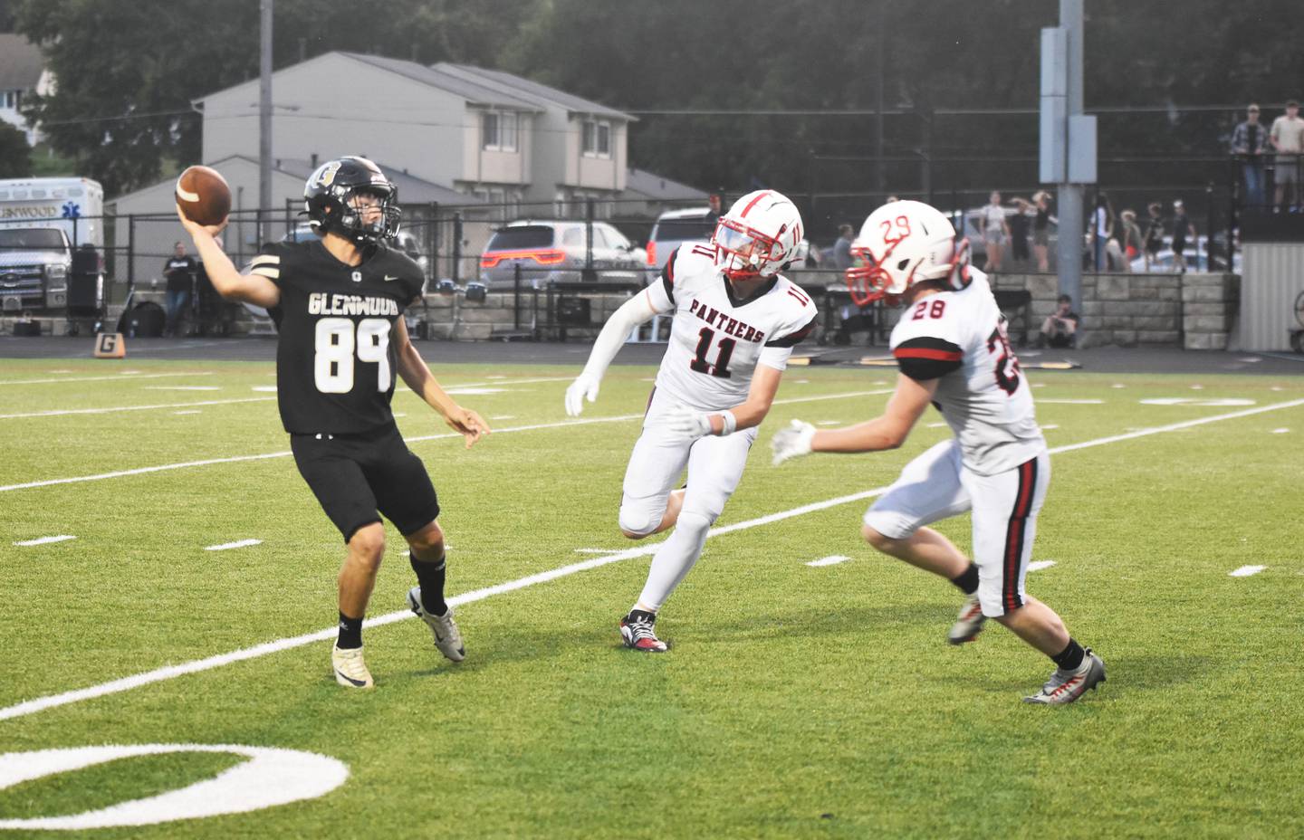 Freshman Riggins Hanson and senior Kal Barber rush punter Jose Diaz on a bad snap. The play was eventually nulified due to an offensive penalty.