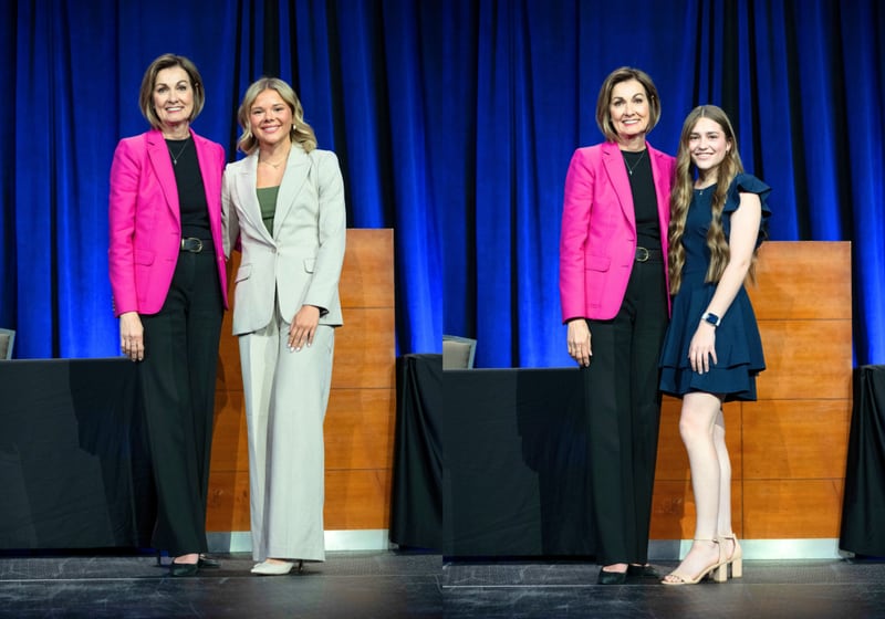 Iowa Governor Kim Reynolds stands with Ava Adamson of Creston, left, and Molly Gennaro of East Union, right, during the Governor's Scholar Ceremony April 27 in Des Moines