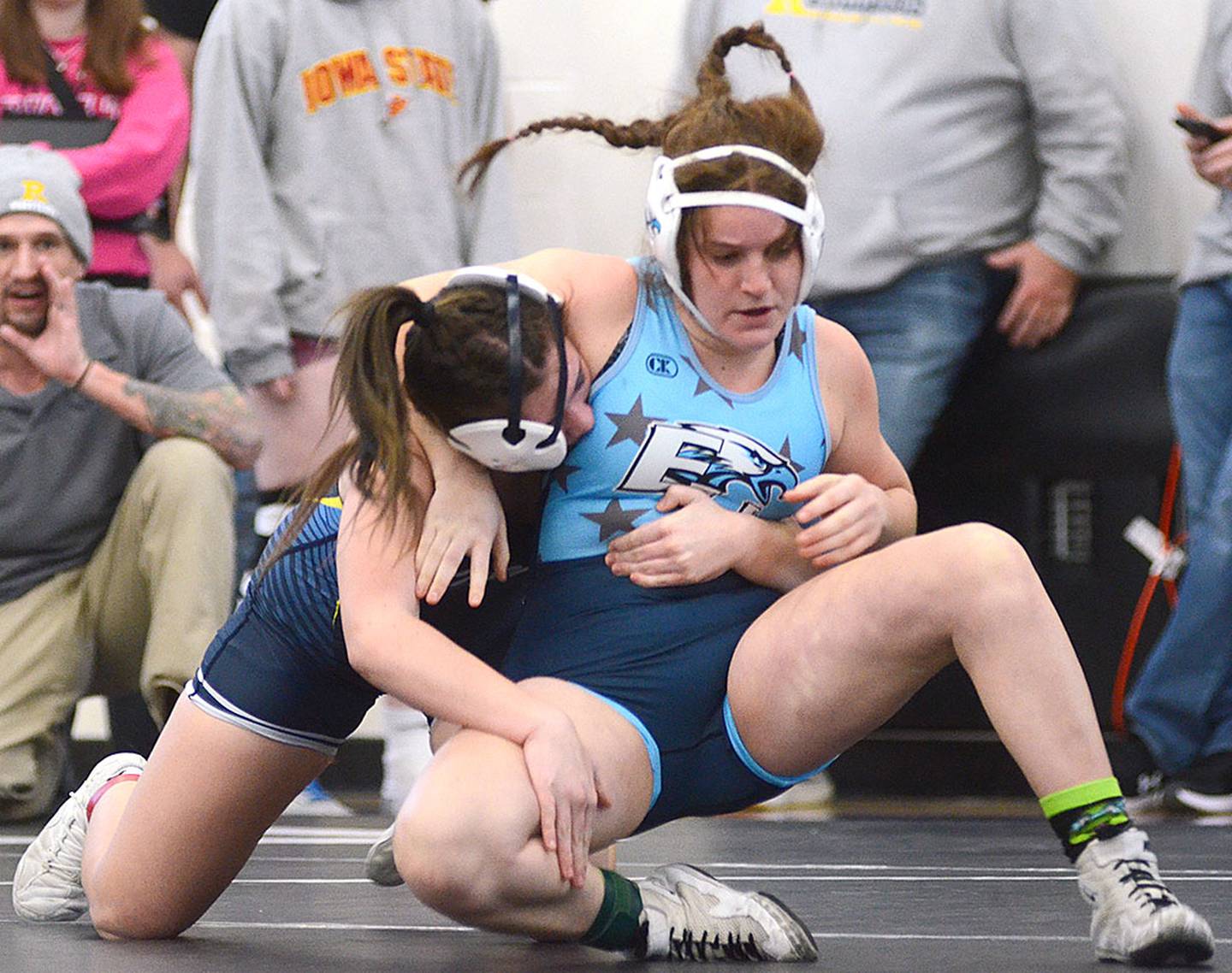 Cheyenne Dike of East Union works to escape from Riverside's McKenna Dorr during their 145-pound championship match Saturday. Dorr won by a fall.