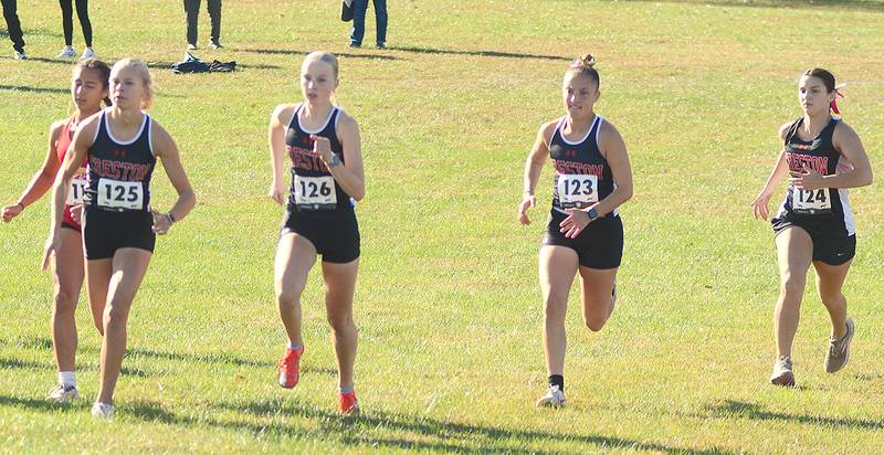 Creston runners breaking from the starting line Wednesday are, from left, Cora Smith, Reese Strunk, Abby Freeman and Grace Keeler.