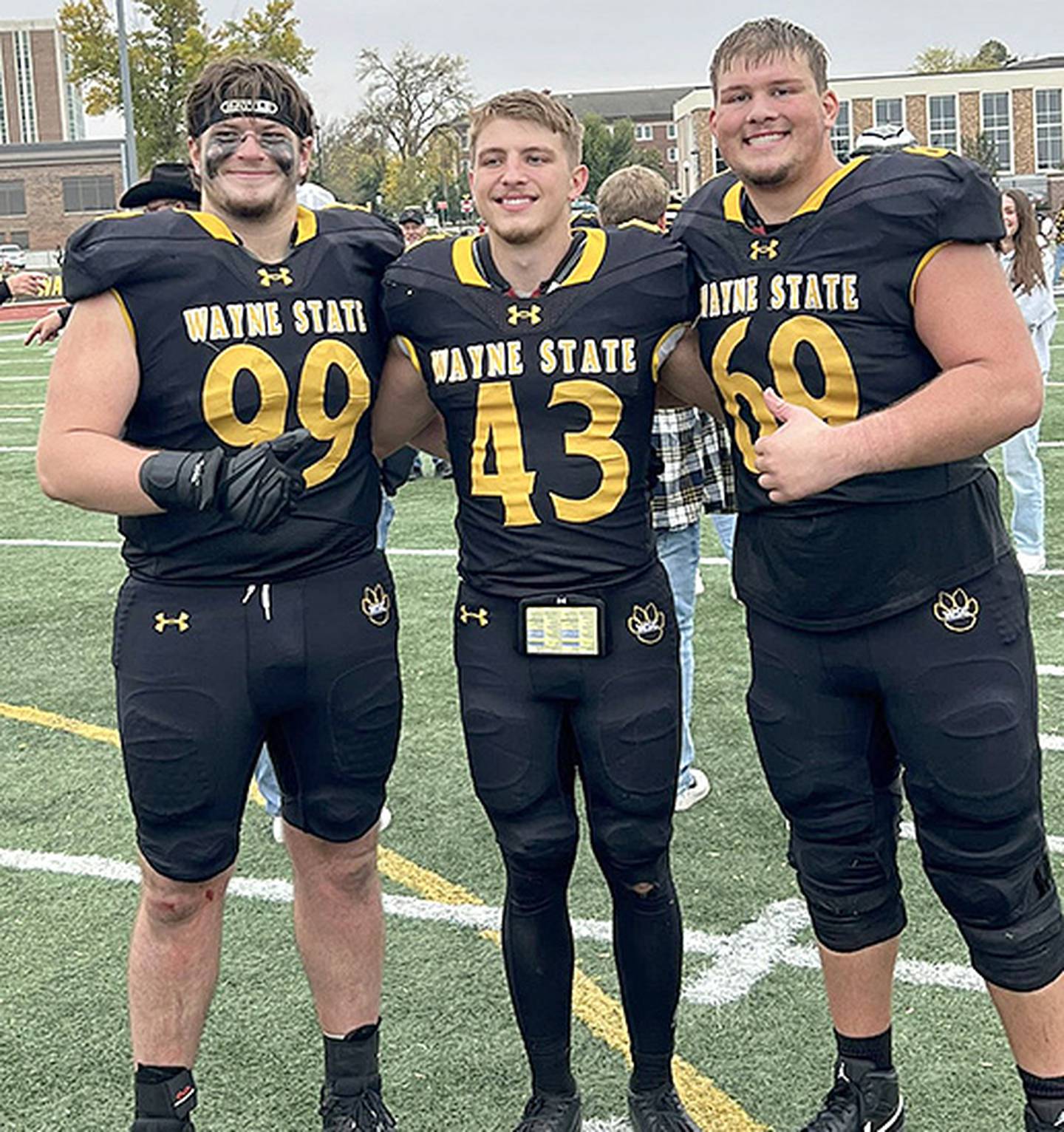 Wayne State players from Creston are, from left, Max Chapman, Brennan Hayes and Quinten Fuller.