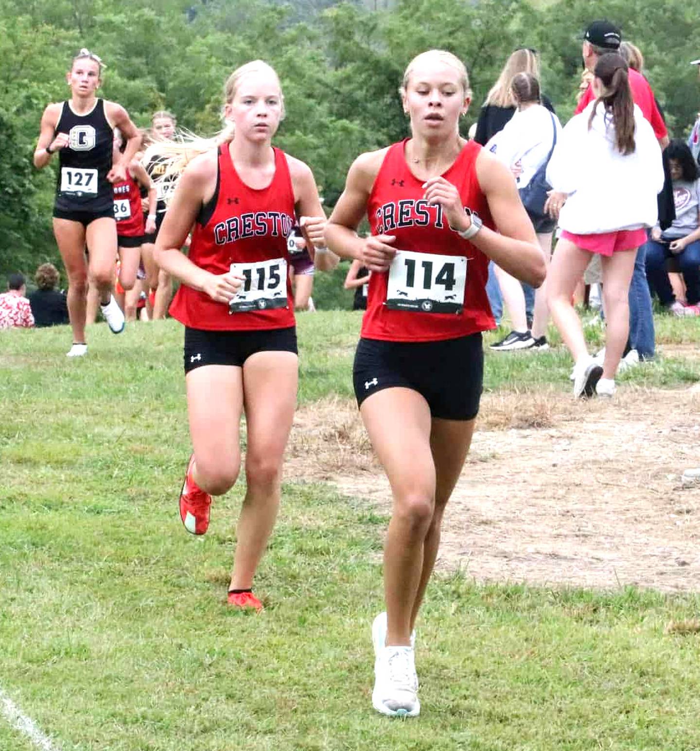 Cora Smith (front) and Reese Strunk both placed in the top 20 Saturday, earning 19th and ninth respectively.