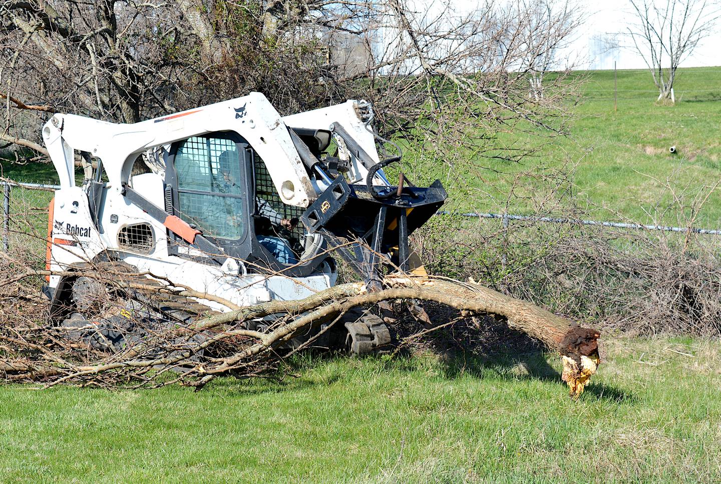 Volunteers during the Greenlawn community cleanup day help haul away debris.