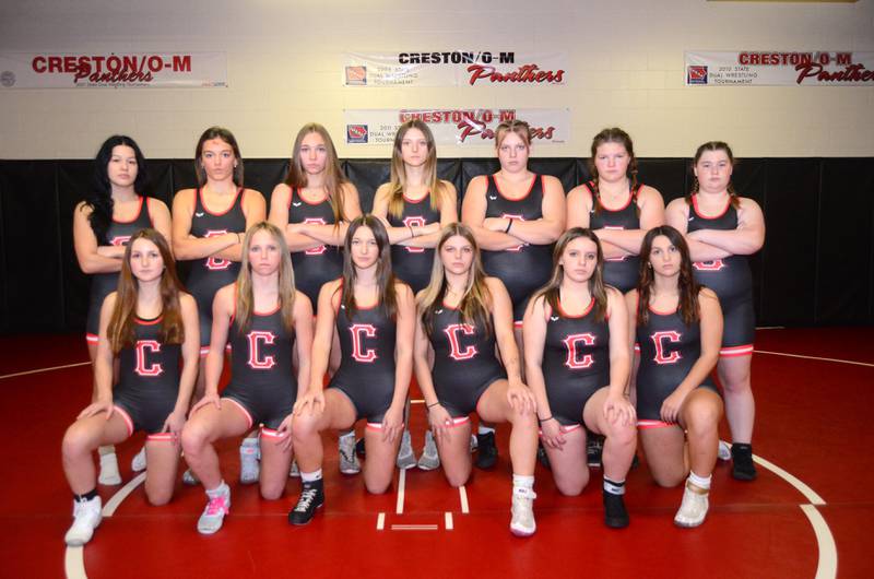 The 2024-25 Creston girls wrestling team. Front row, from left: Nevaeh Chesnut, Karter Clayton, Alainah Galanakis, Evy Marlin, Lydia Williams, Grace Keeler. Back row: Mila Kuhns, Karlie Kruse, Zoey Vandevender, Sydney Hoffman, Christina Strand, Danikka Barber and Braelynn Rice. Head coach Maggie Arnold is assisted by Mario Galanakis and Jeff Bevins.