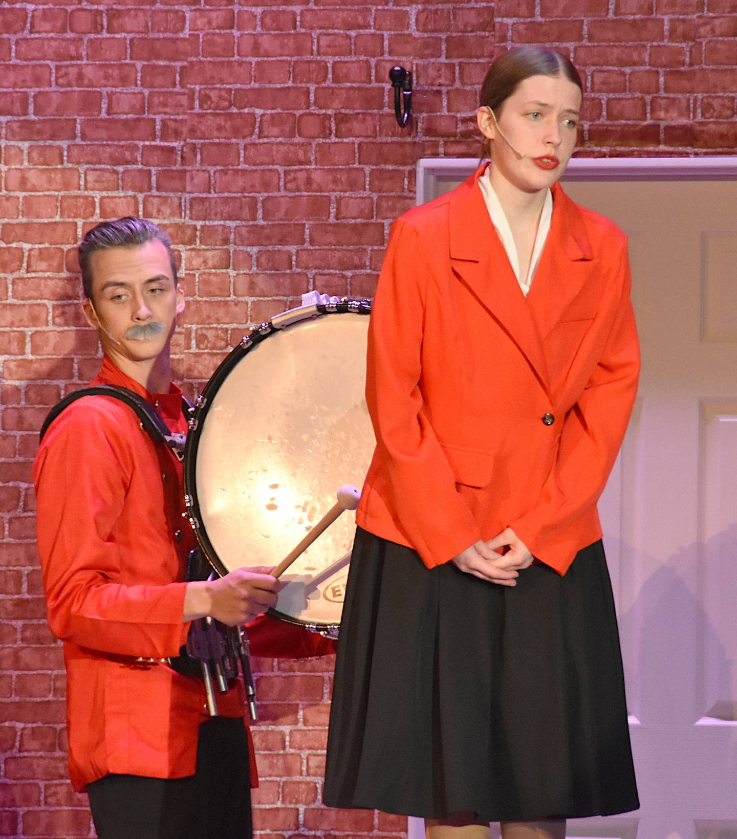 Sarah Brown (right, Caitlin Austin) speaks to the gamblers milling about New York.