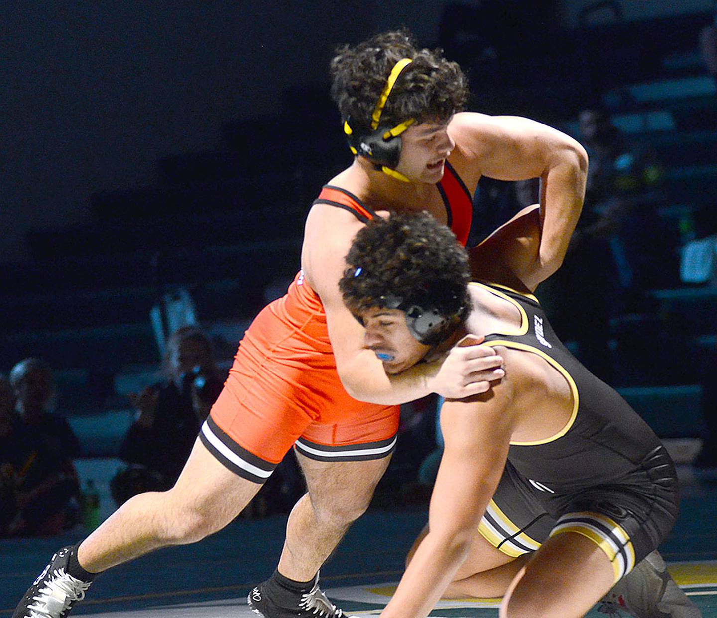 Creston 175-pounder Maddix Leppla gains position against Damien Pestana of Saydel. Leppla won by fall in 1:07.