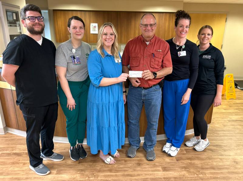 From left, Dylan Downing, ACHS Director of Nursing; Amber Rinke, RN; Jackie Morris, ACHF Director; Mike Rosenbohm, Mikal Rasmussen, ARNP, Philicia Hancock, ACHS CCO