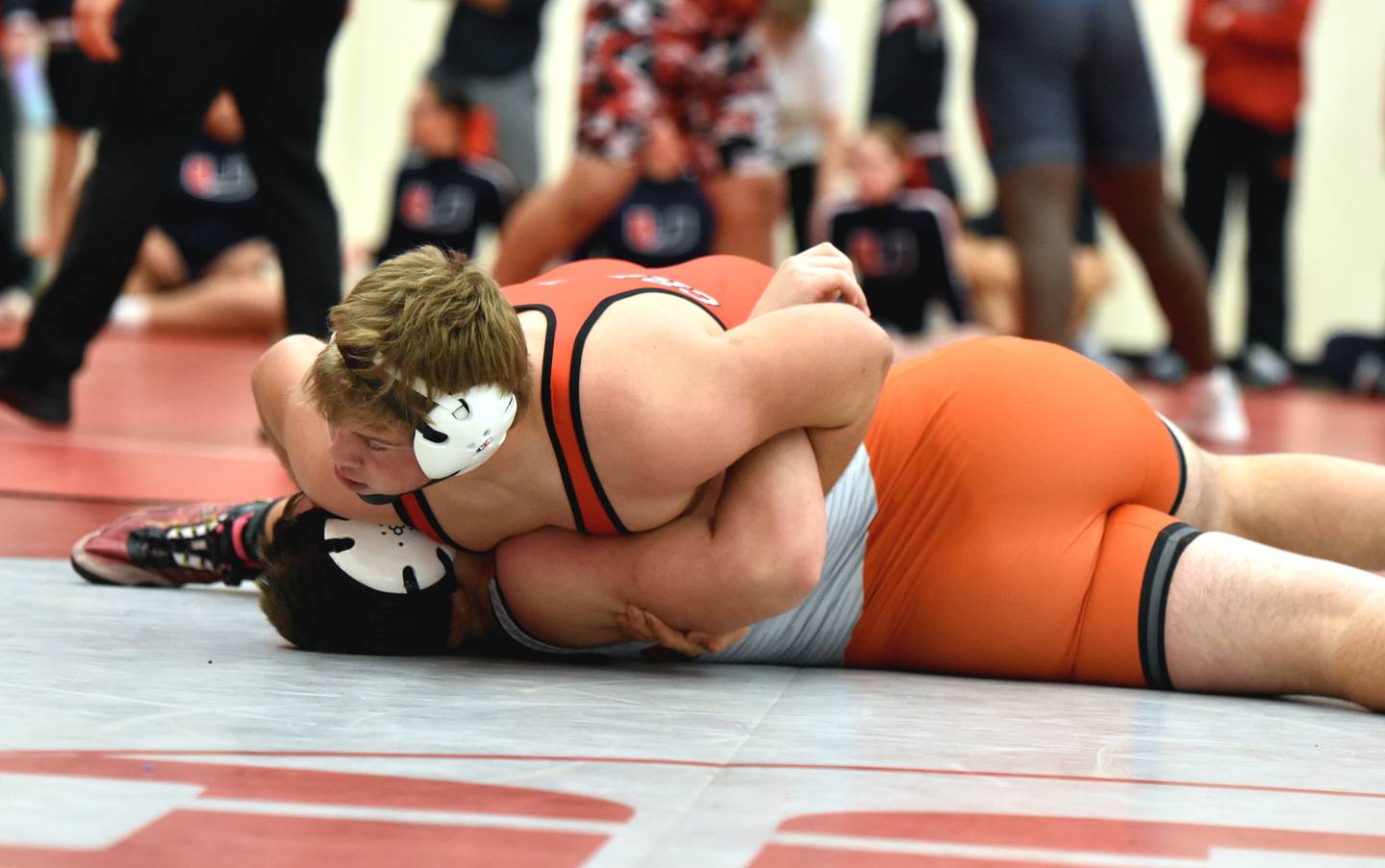Quinten Fuller (215) pins Gavin Holt of Carroll in the semi-finals to advance to the finals where he defeated Mason Roethler of Johnston to win his weight class.