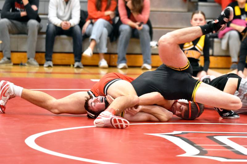Creston senior Lane Travis uses his lower body to pin Lenox’s Levi Fitzgerald Thursday in the Panthers’ opener, a quadrangular with Lenox, South Harrison and Woodward-Granger. Travis won all three of his bouts by pin and won the 138-pound bracket Saturday at the Joe Fitch Invitational in Humboldt.