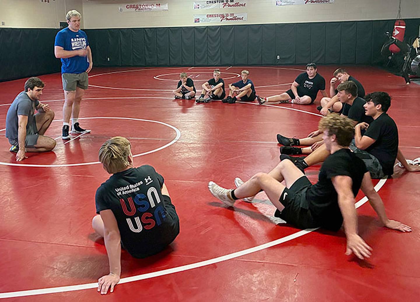 University of Nebraska-Kearney All-American wrestlers Crew Howard of Clarinda (standing) and Jackson Kinsella of Creston take questions from clinic participants Sunday afternoon. Howard and Kinsella each have one season left at UNK after placing fourth and third, respectively, in the 2025 NCAA Division II tournament.