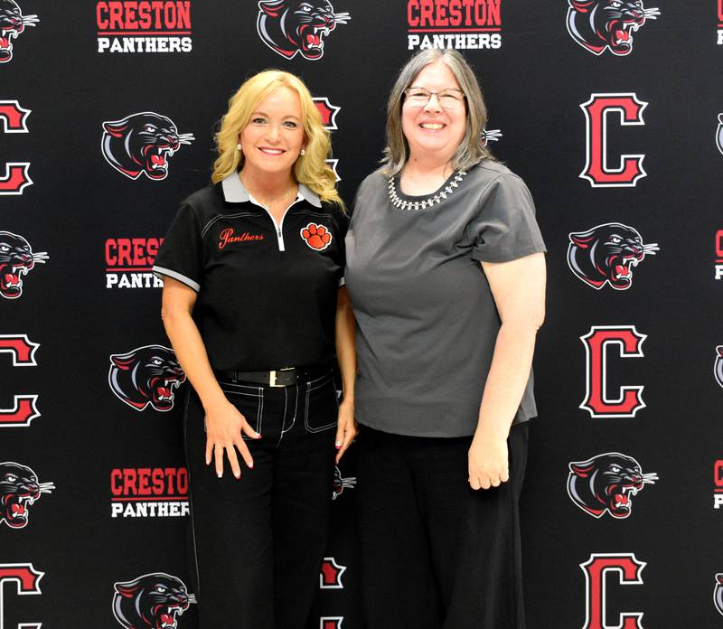 Wendy Hartstock (left) and Sue Dake were honored for their retirements Friday. Not pictured: Dan Little and Becky Harris.