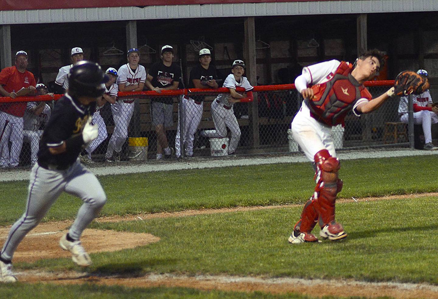 Creston catcher Brady McDonald catches a popup near the plate to end Glenwood's seventh inning Thursday. The Panthers rallied in the bottom of the seventh to force extra innings.
