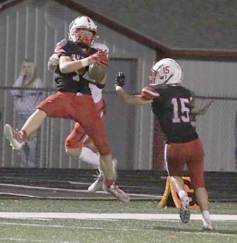 Creston defensive back Jack Walter intercepts a Harlan pass late in the first half Friday to preserve a 22-14 lead at the break. The Panther defense had two interceptions in the 25-22 victory.