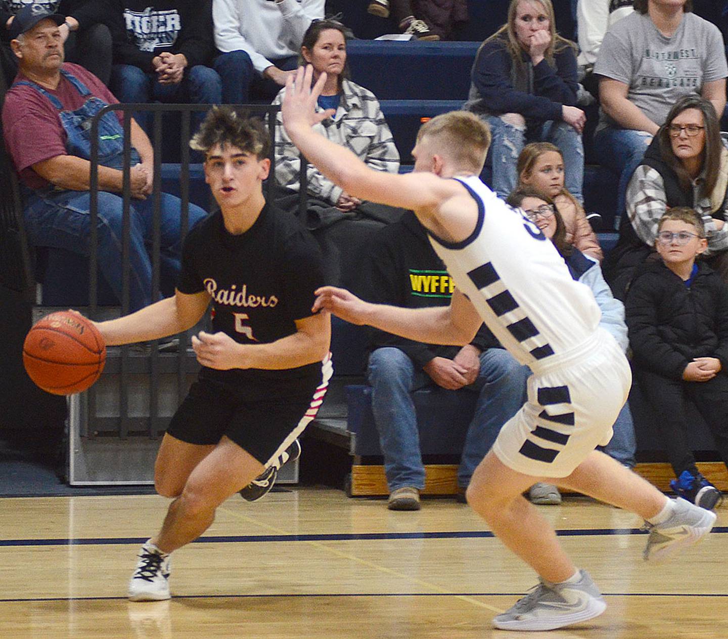 Mount Ayr's Adler Reed drives the baseline against Bedford Thursday.