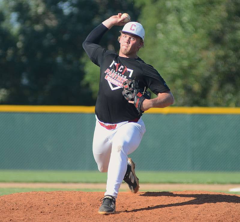 Creston's Tom Mikkelsen delivers a pitch against Kuemper Catholic. Mikkelsen struck out nine batters and hit a three-run homer in a 10-2 victory to open the doubleheader.