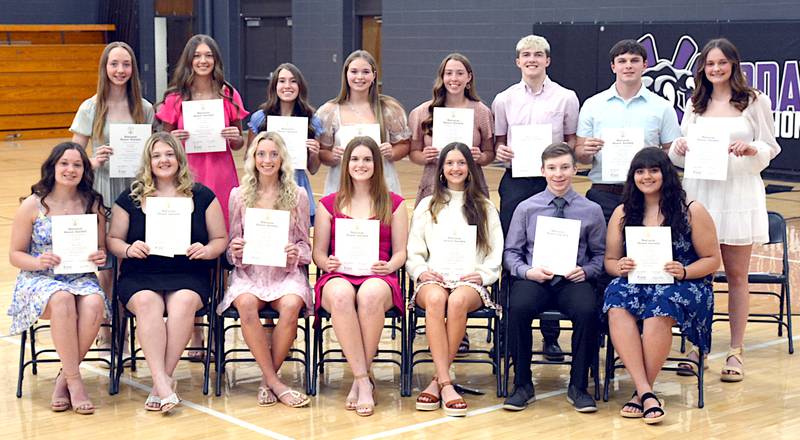 Inducted Monday, March 31, to the National Honor Society, in a ceremony in the high school gym were from left in front, Caroline Britten, Brailyann Coffmann, Izzy Eisbach, Kacie Ford, Kenna Ford, Titus Hamer, Gracelyn Lewis; back row: Kylie Nelson, Chloe Rardin, Mallory Russell, Kiara Stevens, Lea Stonebraker, Ty Strode, Remington Woosley and Abbigail Zenor.