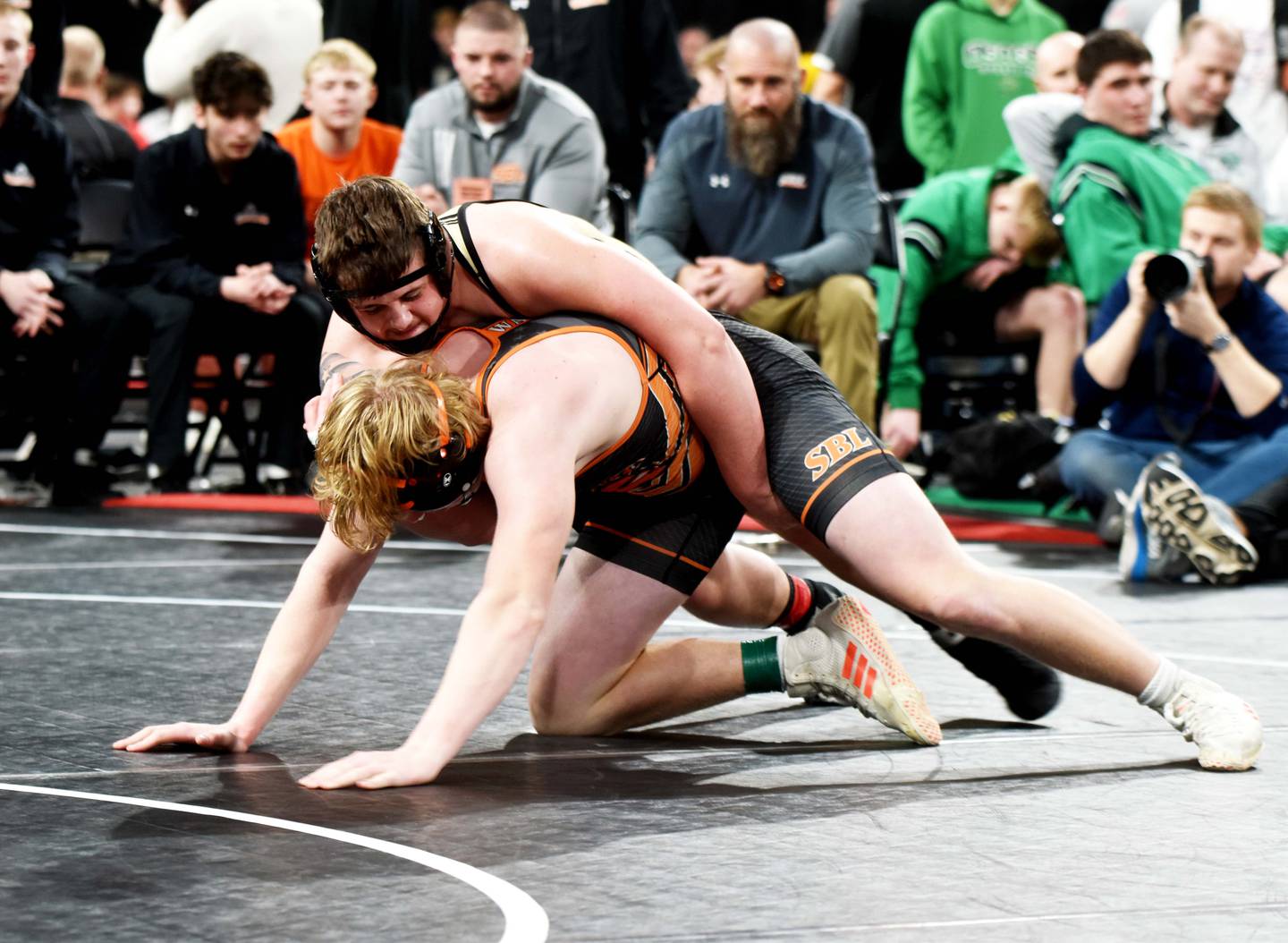 Senior Jagger Luther maintains control of Will Ryan in the final match of the Class 2A State Duals finals. Before Luther took the mat, the dual was tied at 33. Luther won the bout in a 7-1 decision, giving Creston its second State Duals title.