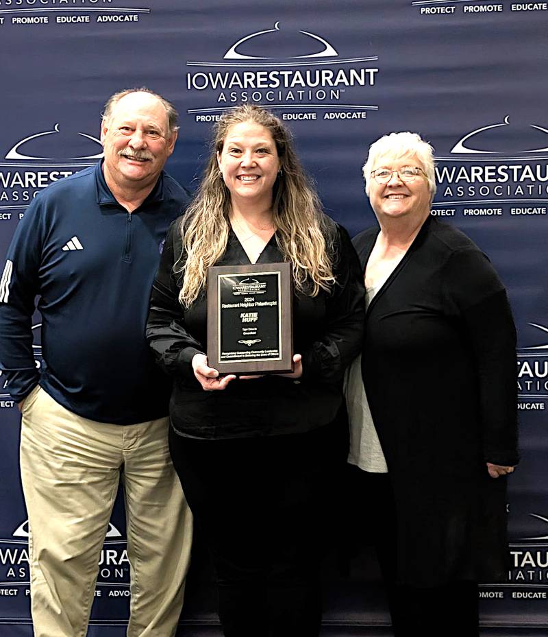 Tiger Drive-In manager Katie Huff (middle) with parents/owners Dave and Kendalyn Huff.