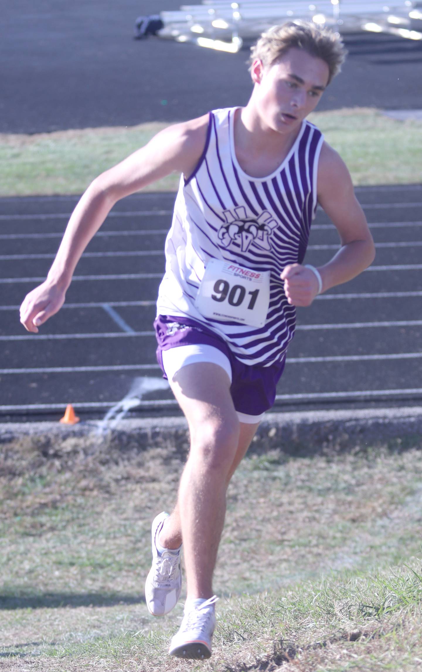Wolverine sophomore Gabe Winkelmann embarks on a small hill during the state qualifying race Oct. 23 in Guthrie Center.