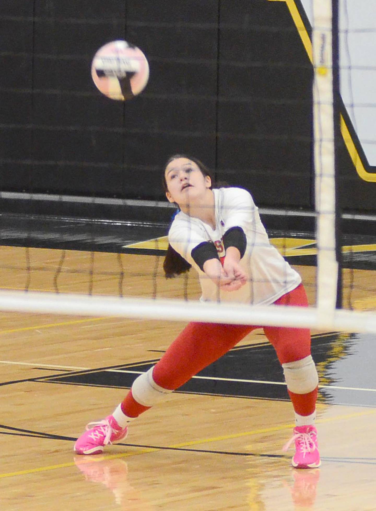 Creston libero Mila Kuhns receives a Winterset serve during Tuesday's regional match. Kuhns had a team-high eight digs.