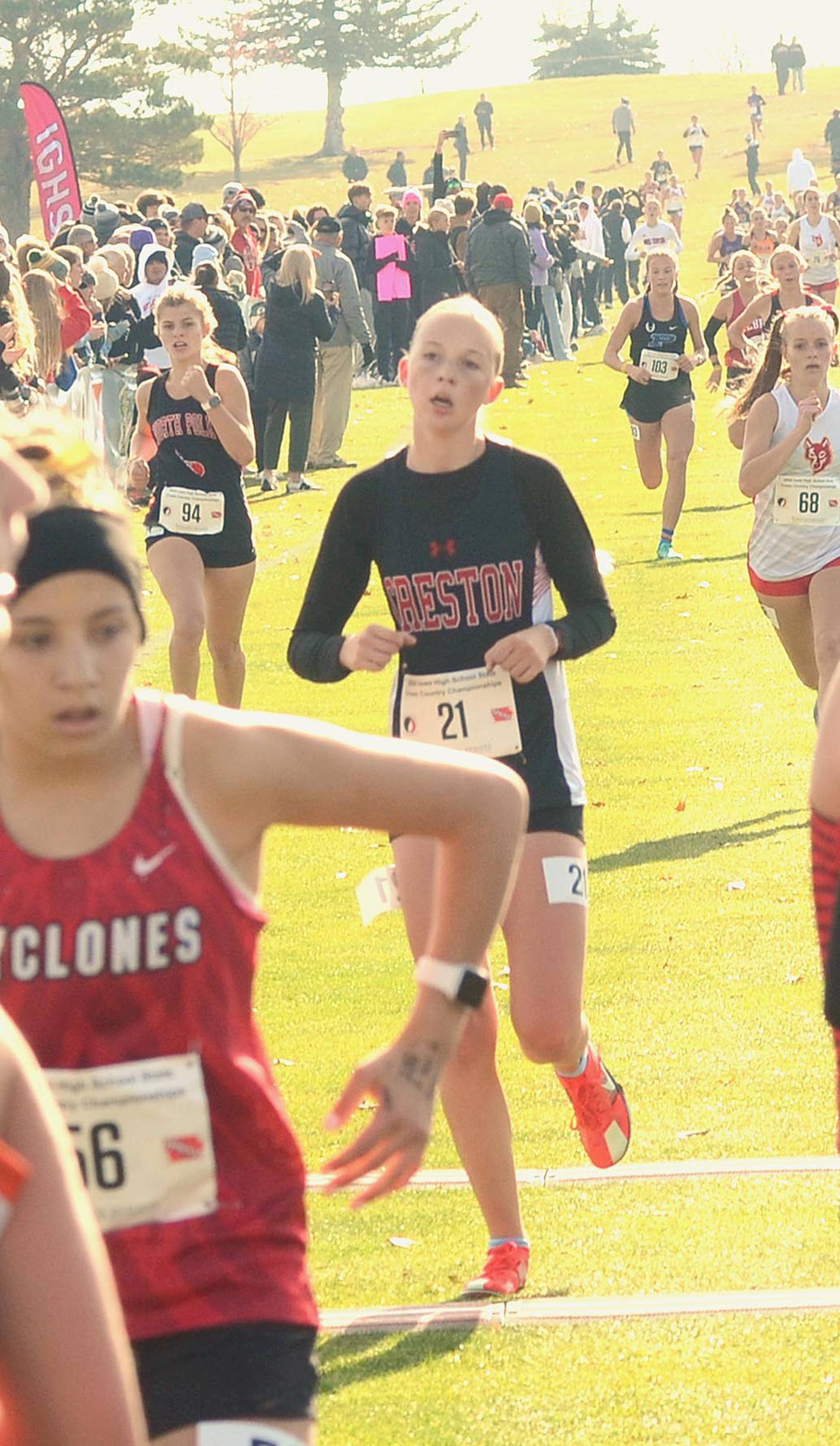 Creston's Reese Strunk crosses the finish line in 21:19.5 in the 5-kilometer (3.1 miles) race in Class 3A girls competition Friday at Lakeside Golf Course in Fort Dodge.