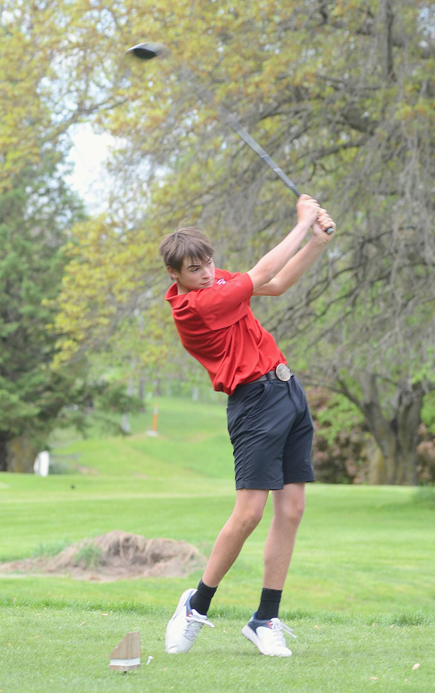 Creston freshman Branden Spencer tees off on No. 4 at Crestmoor during Wednesday's Hawkeye Ten Tournament. Spencer shot 93 in his first conference meet.