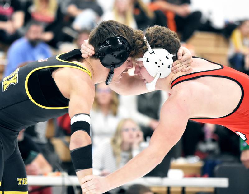 Laramie Stoaks of Lenox and Jackson Pettegrew of Creston grapple in the 175-pound consolation finals Saturday at the John J. Harris Invite in Corning. Pettegrew took fourth while Stoaks was sixth.