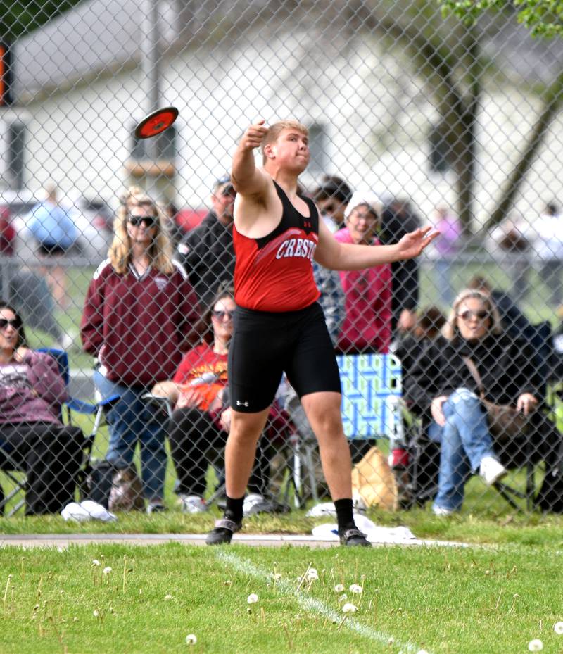 Senior Quinten Fuller launches the discus. Fuller placed fourth in shot put, teammate Tom Mikkelsen earning the title.