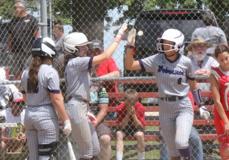 Nodaway Valley's Chloe Rardin (6) gets a high five from a teammate during a recent softball game against Orient-Macksburg.
