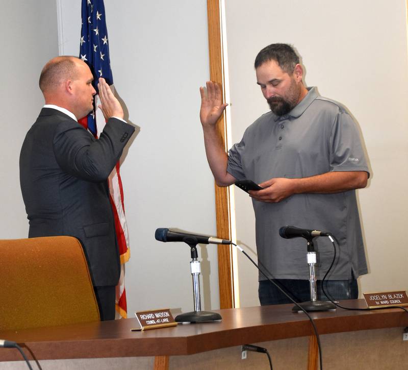 Cameron Hale is sworn in as Creston Chief of Police by then-Mayor Waylon Clayton on Monday, Sept. 22.