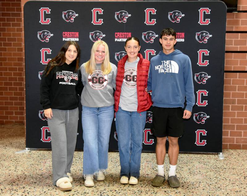 The 2025 cross country seniors, from left: Grace Keeler, Maylee Riley, Abby Freeman and Hector Suazo.