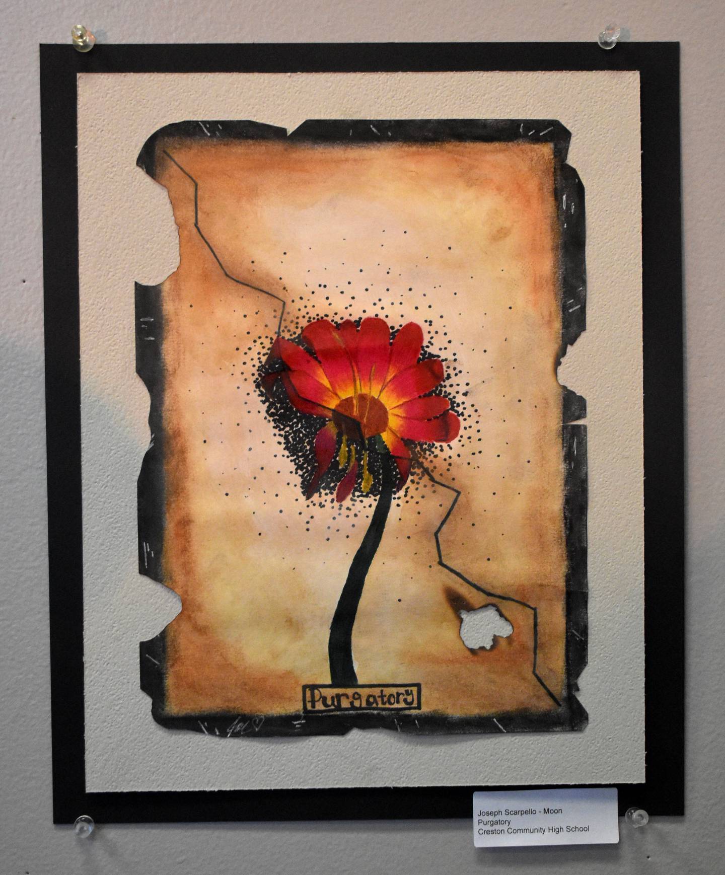 Senior Joe Scarpello-Moon's work is based on tarot cards.