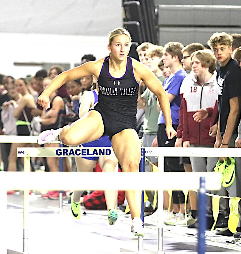 Nodaway Valley senior Annika Nelson runs the 55-meter hurdles in Graceland University's home high school indoor meet.