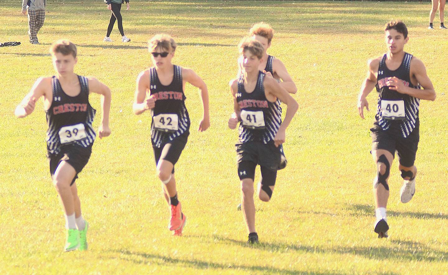 Members of the Creston boys team shown near the starting line at the beginning of Wednesday's state qualifying race are, from left, Austin Jondle, Merrick Wieland, Matthew Warner and Hector Suazo. Creston placed 10th as a team with 219 points.