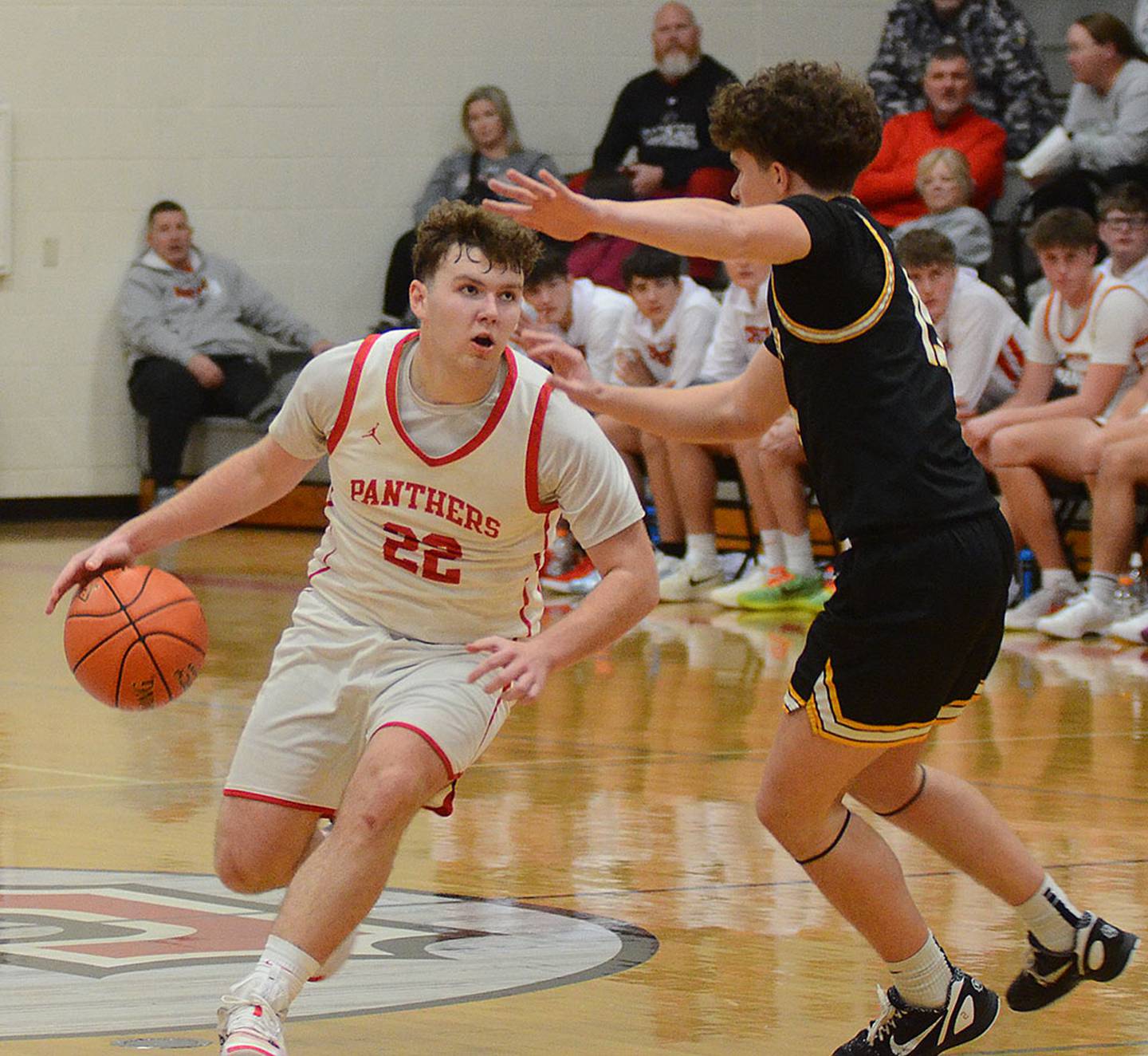 Nate Carroll drives toward the basket Monday in a 68-43 loss to the Winterset Huskies.