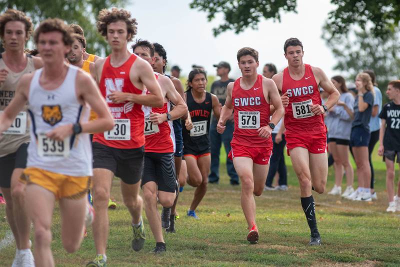 SWCC's Brandon Briley of Creston, left, and Zach Roome run together during the Greeno/Dirksen Invitational Saturday. Briley ran a 28:04, missing the national-qualifying time by four seconds.