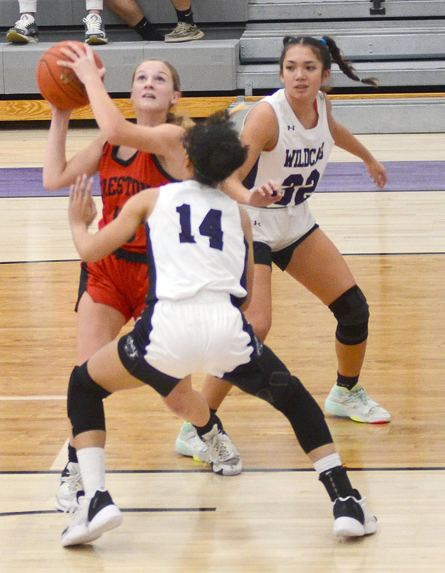 Creston's Kadley Bailey puts up a shot in the lane against Tia Williams of West Central Valley Tuesday. Bailey scored a team-high 19 points along with seven rebounds and seven steals in the 51-46 win.