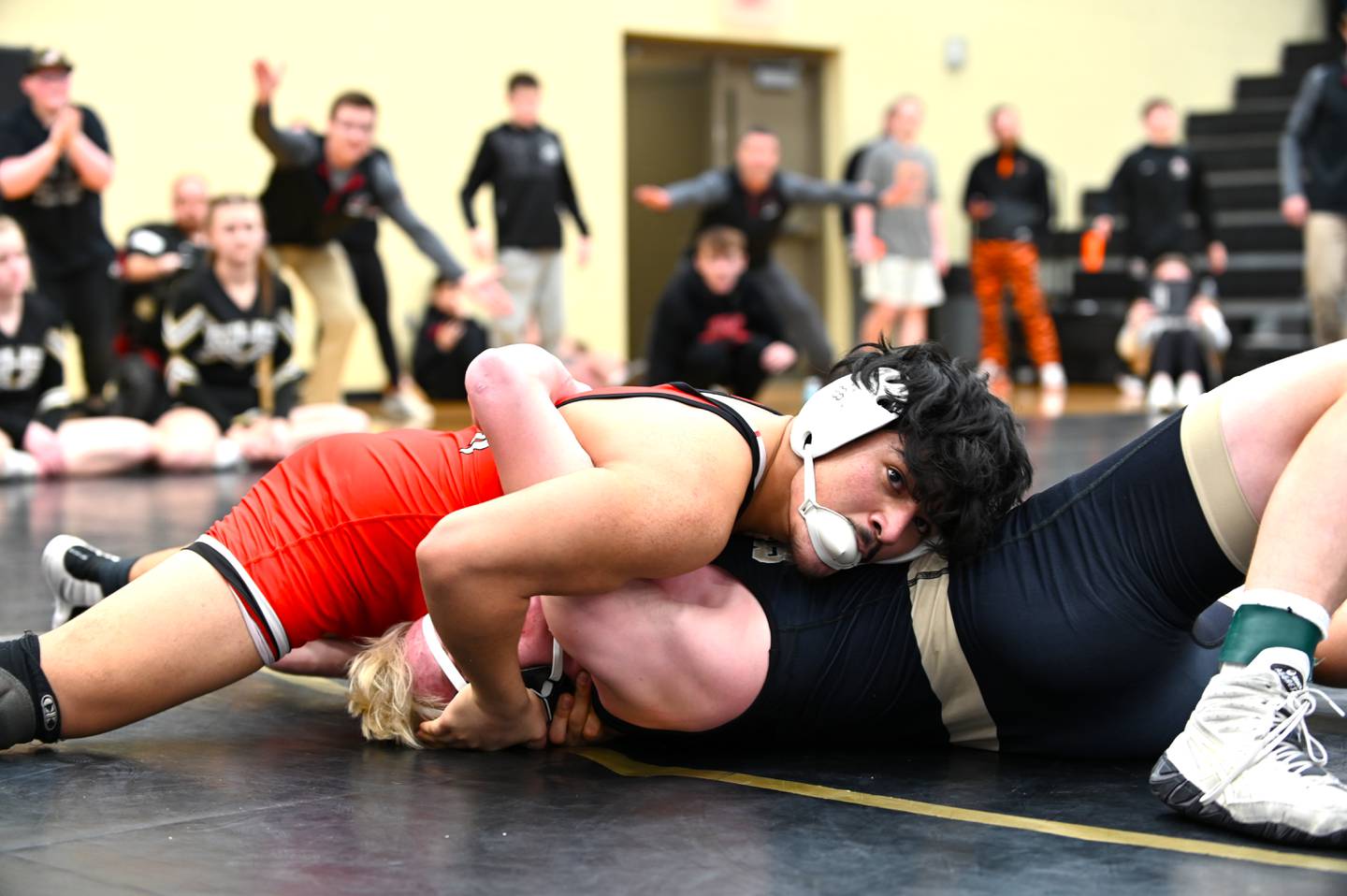 Jose Avila pins Glenwood's Trey Williamson in the third-place match.
