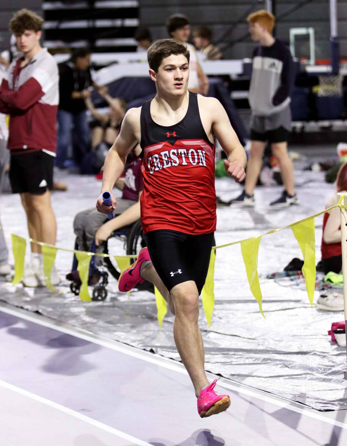 Brandon Briley runs a relay leg. Briley was a part of the winning 4x800 and distance medley relay teams.