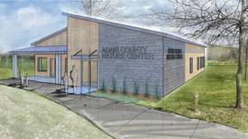 Conservation talks building nature center/office facility