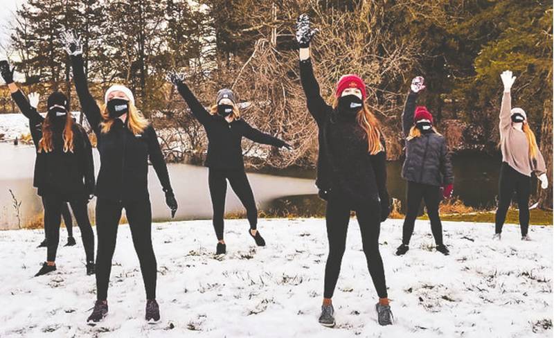Dancing in cold temperatures on a blanket of snow in Cedar Park are Spotlight students. Pictured, from left, are Danica Pokorny, Hallie Orr, Jurneé Harvey, Braylee Pokorny, Anna Bolinger and Violet Franklin.