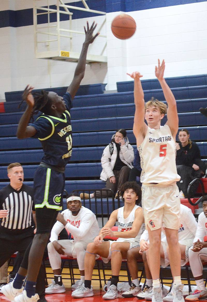 Southwestern's Patrick Worrell (5) launches a shot against Western Iowa Tech Wednesday. Worrell had four 3-pointers and a team-high 19 points in the 75-66 victory.
