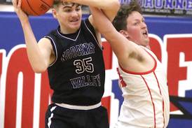 NV boys split last regular season games