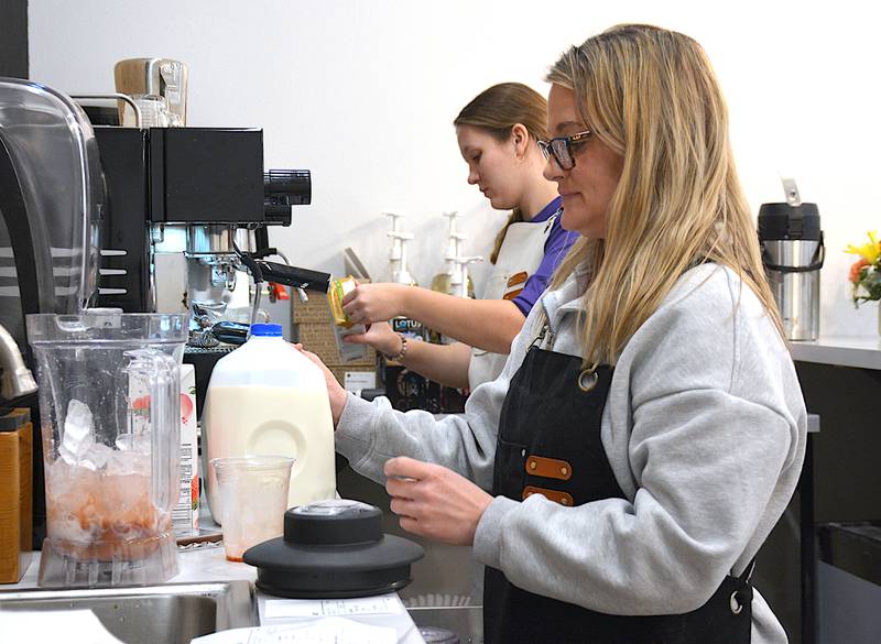 Morgan Antisdel makes a strawberry smoothie for a customer last week at Moe's RBF (Random Breakfast Food) on the northwest side of the Greenfield square.